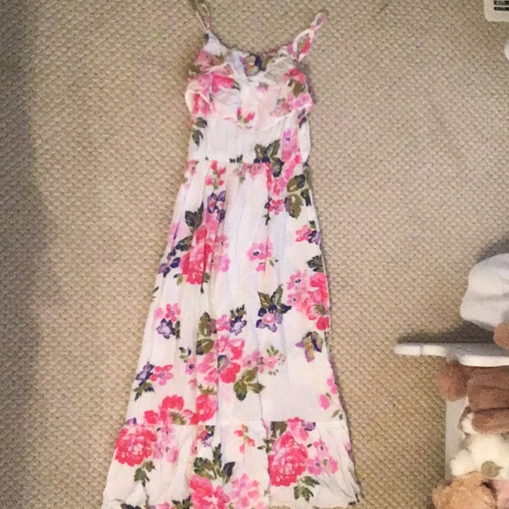 White, pink, green, and blue girls flower dress.